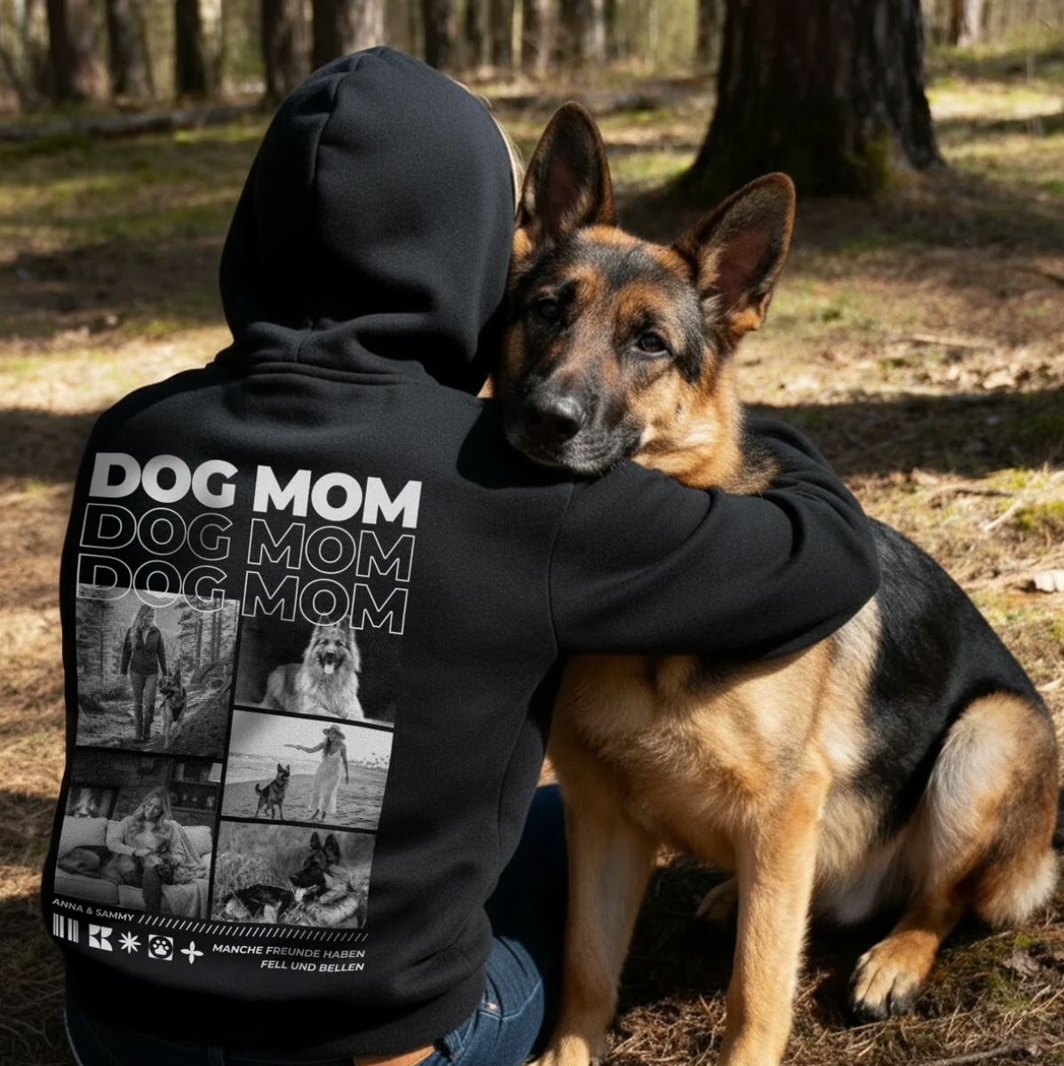 Schwarzer Hoodie mit "Dog Mom"-Motiv, Person umarmt einen Schäferhund im Wald.