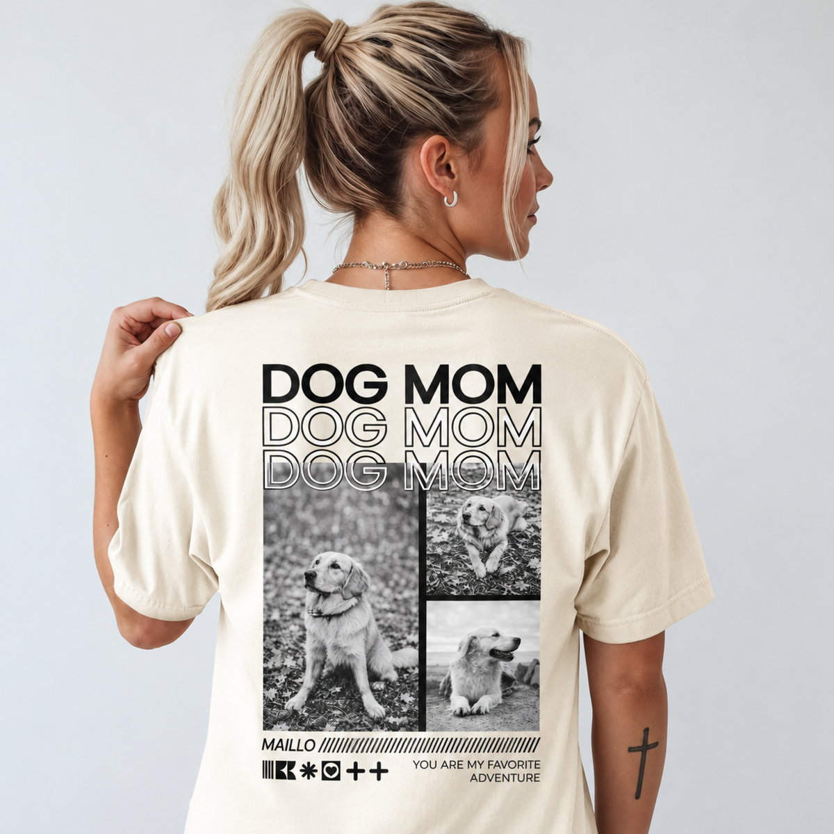 Beige T-Shirt mit Hundemotiven und Schriftzug „DOG MOM“ auf der Rückseite.