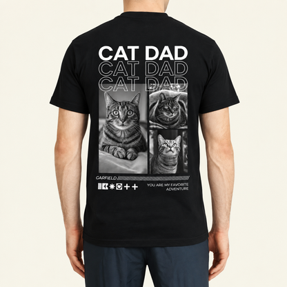 Schwarzes T-Shirt mit dem Schriftzug "Cat Dad" und Fotos von Katzen auf der Rückseite.