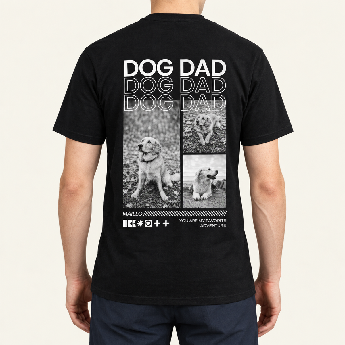 Schwarzes T-Shirt mit Druck "DOG DAD" und Fotos von Hunden auf dem Rücken. Baumwollmaterial, lässige Passform.