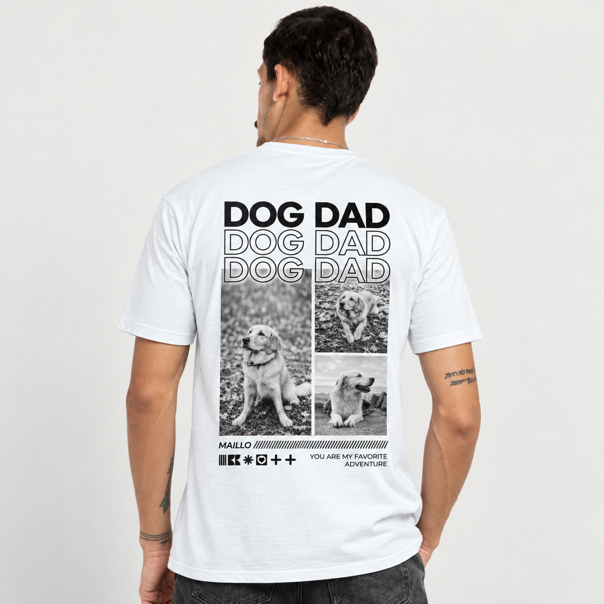 Weißes T-Shirt mit Aufdruck "DOG DAD" und drei Bildern von Hunden auf der Rückseite.