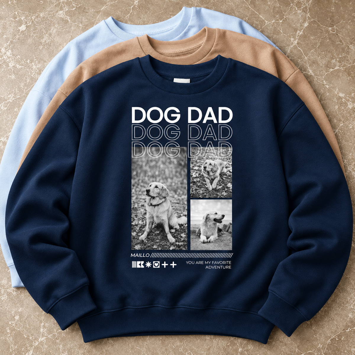 Drei Sweatshirts in verschiedenen Farben, eines navy mit Dog Dad Grafik und Hundebildern.