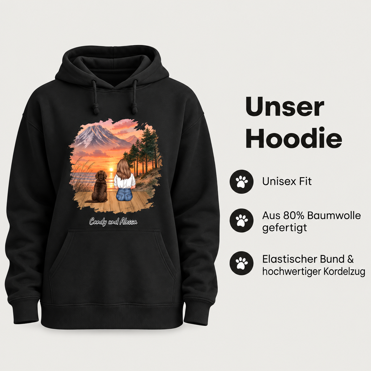 Schwarzer Hoodie mit personalisierter Grafik von einer Person und einem Hund vor Bergen und Sonnenuntergang.