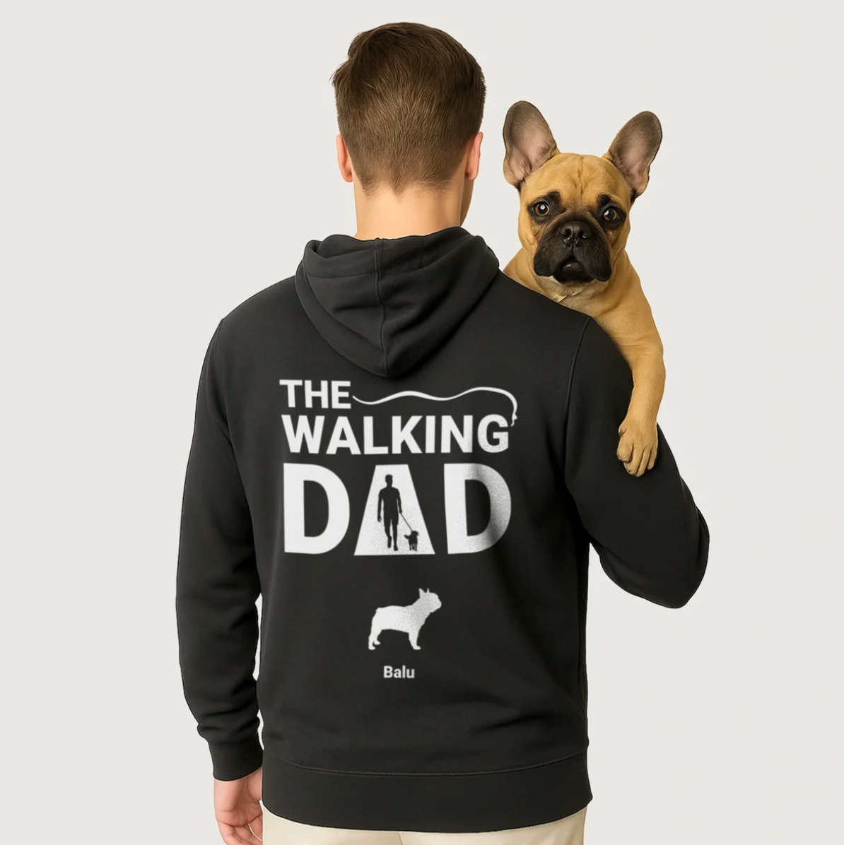 Schwarzer Hoodie mit dem Aufdruck "THE WALKING DAD" und einem Hundemotiv auf der Rückseite.